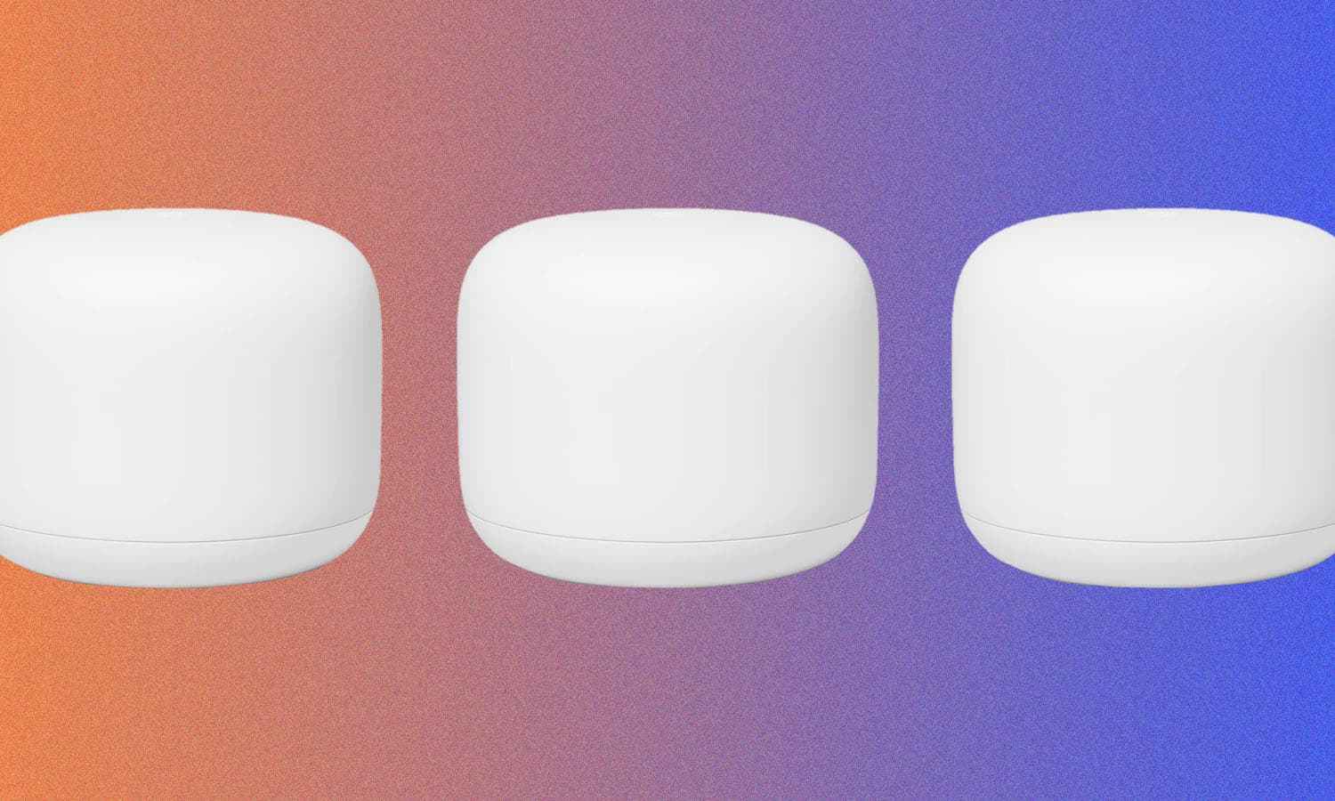 Three Google Nest Wifi Routers against an orange and blue background.