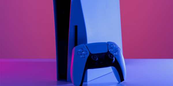 PS5 console and wireless controller against a purple background.